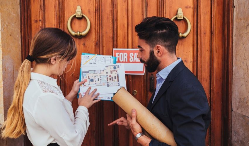 real-estate-agents-working-building-s-main-entrance_23-2147650201 real-estate-agents-working-building-s-main-entrance_23-2147650201