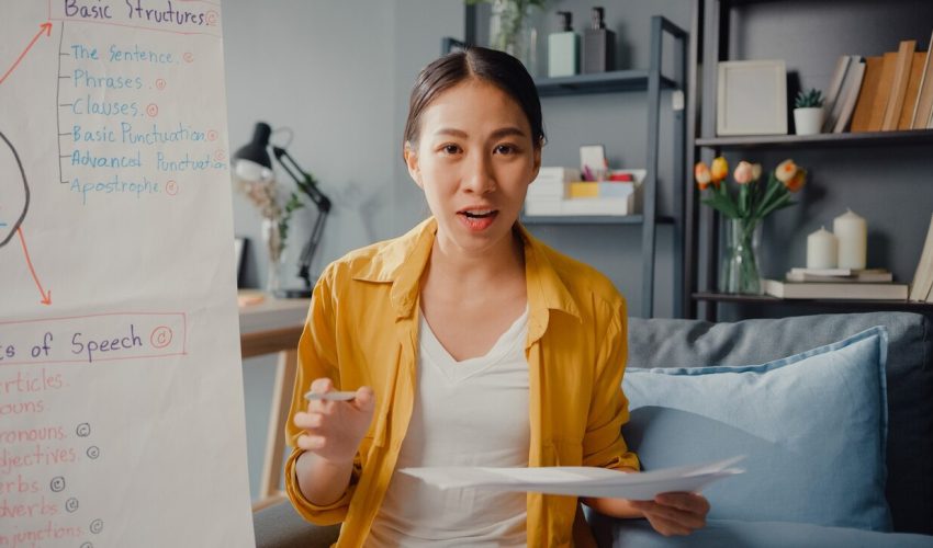 young-asian-lady-english-teacher-video-conference-looking-camera-talk-by-webcam-learn-teach-online-chat-home_7861-2805 young-asian-lady-english-teacher-video-conference-looking-camera-talk-by-webcam-learn-teach-online-chat-home_7861-2805